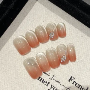 Teardrop Nude Press-On Nails with Cat-Eye Shimmer